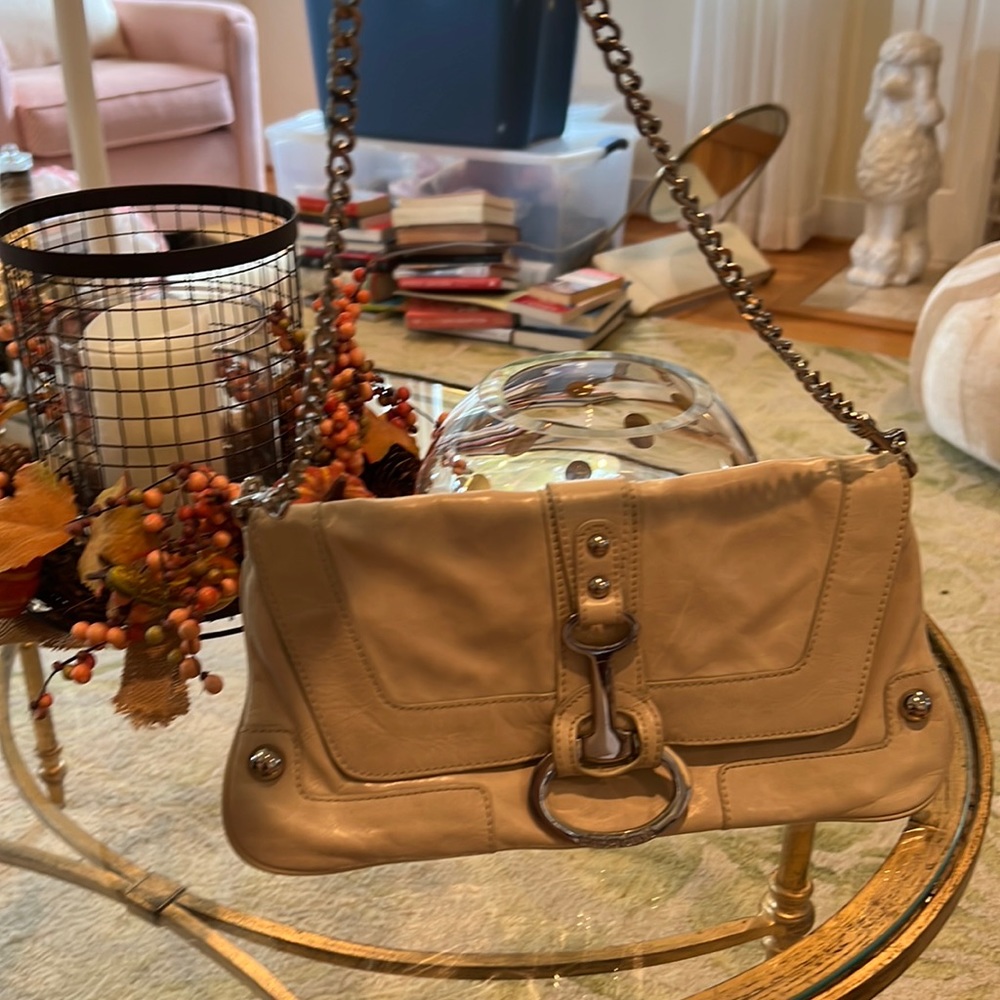 Charles David bag with silver tone hardware. Detachable strap.